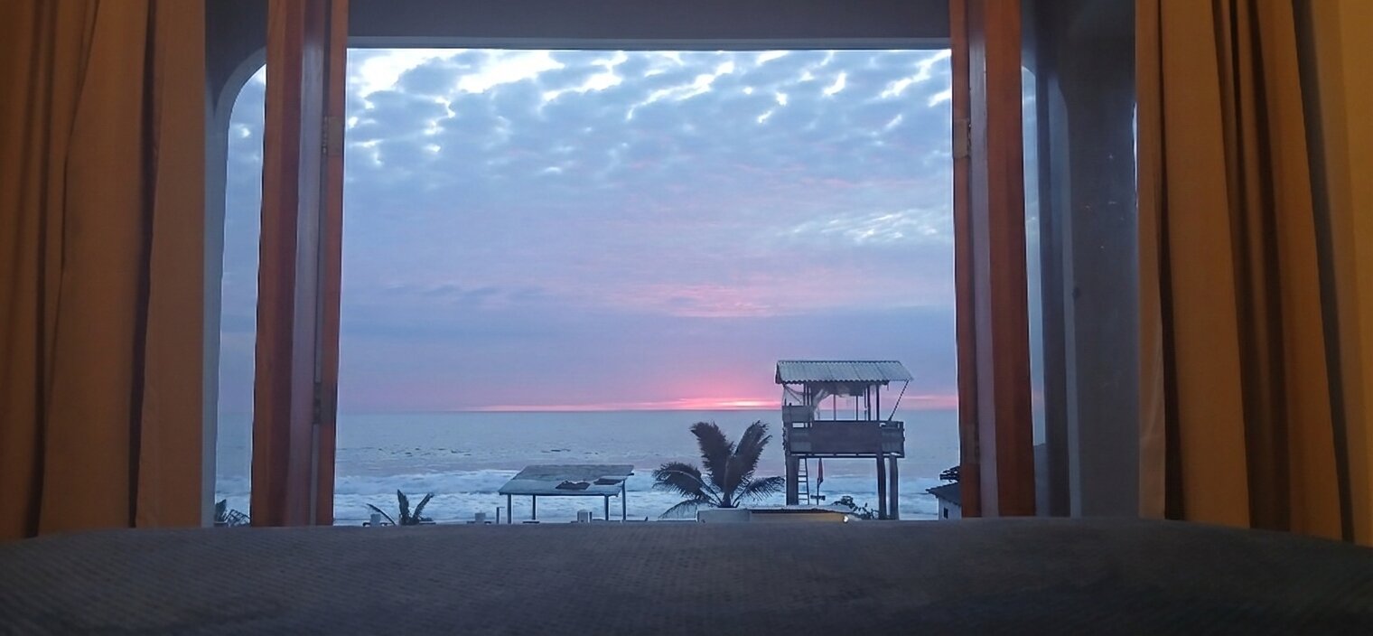 View from the bed toward the ocean