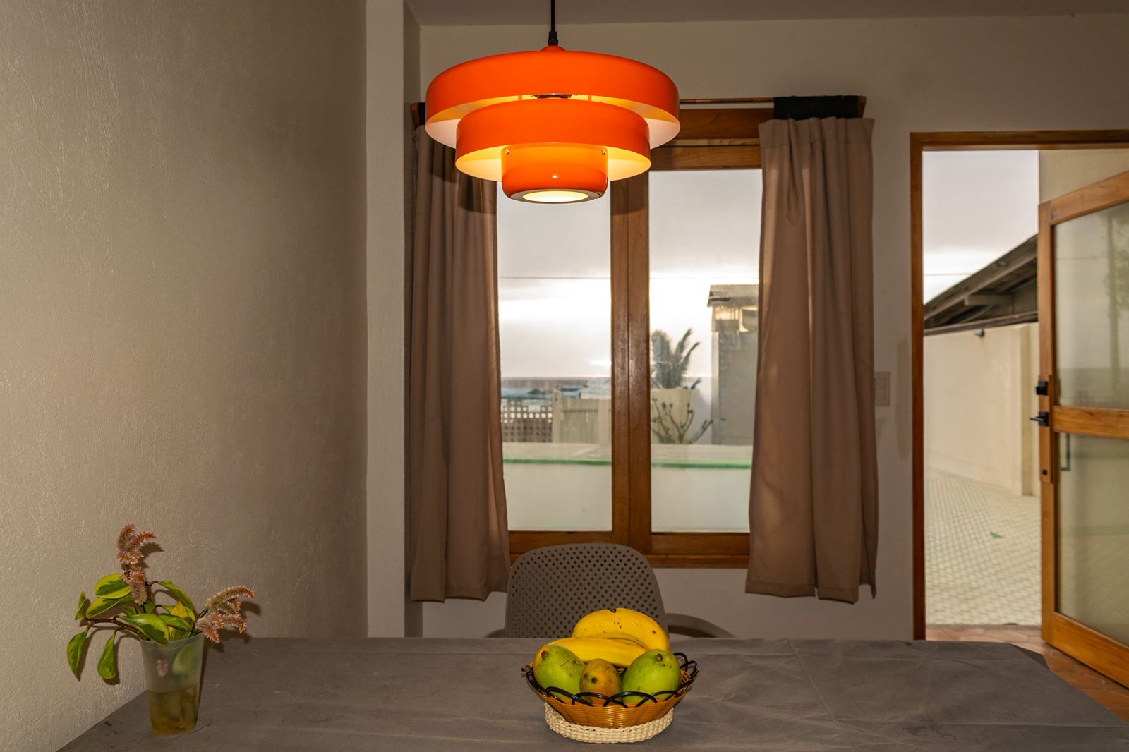 Dining area with pendant lamp