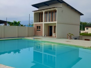 Pool and apartment from the ocean side